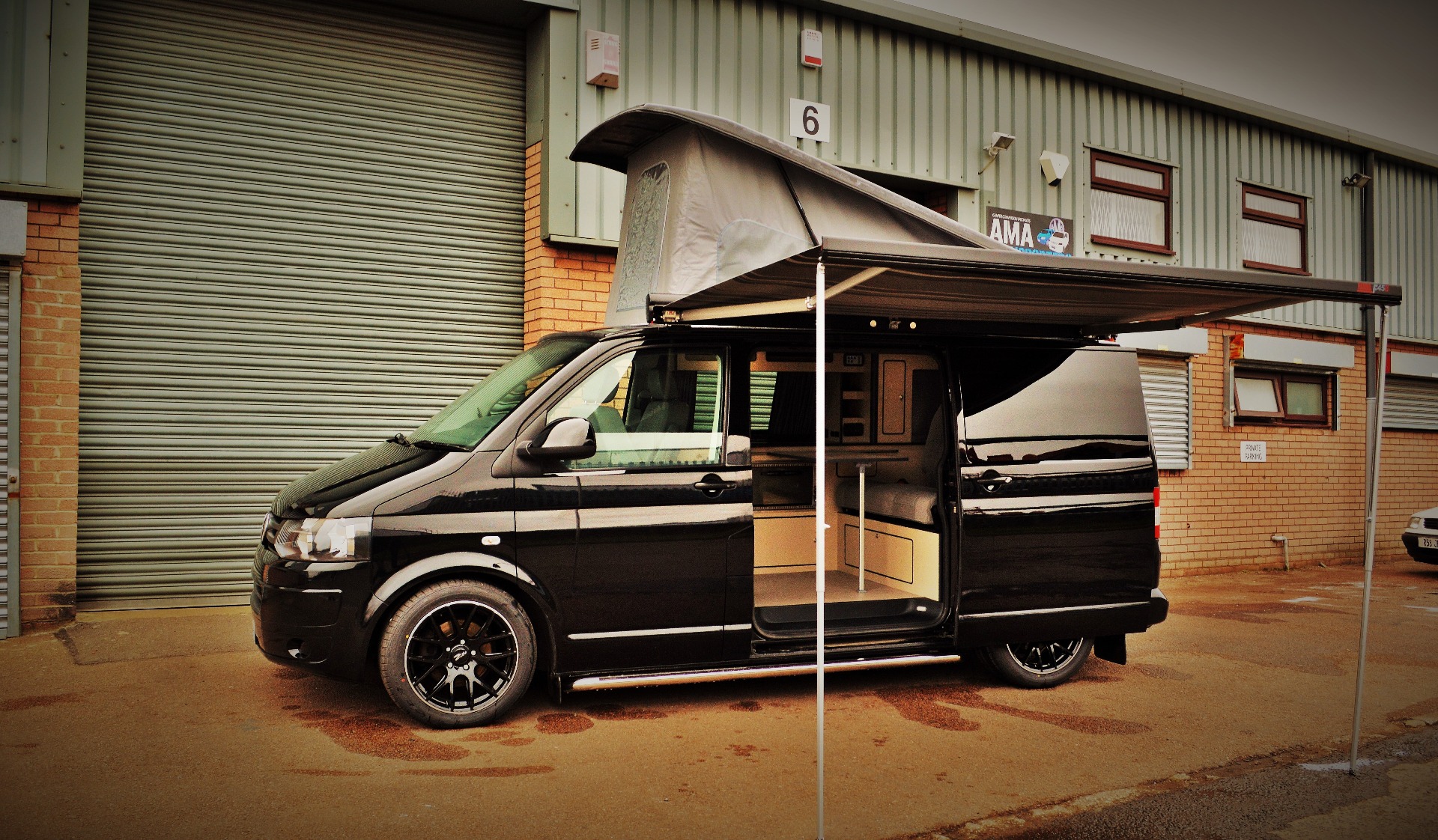 With Fiamma F45s awning and Austop Elevating roof.